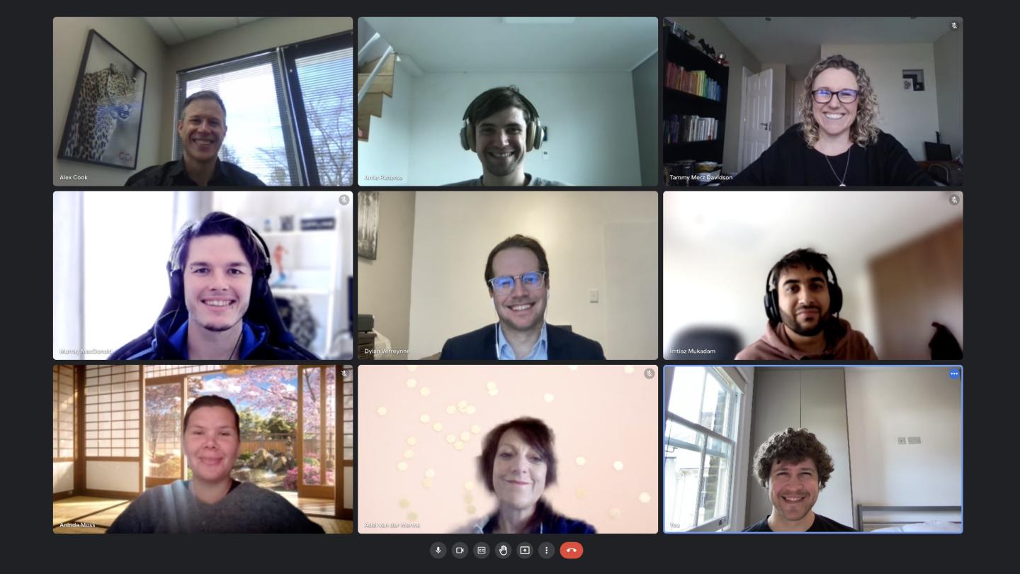 Screenshot of the Wealthbit on a Google Meet video call, everyone's smiling